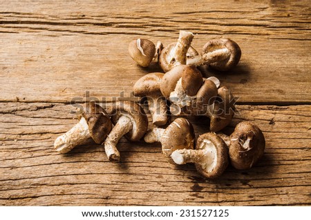 Group of Fresh Harvest Mushroom on Wood Table Background, Concept and Idea of Food Cook Rustic Still life Style.