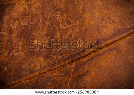 Worn Old Brown Leather for Concept and Idea Style of Fine Leather Crafting, Handcrafts Workspace, Handmade, handcrafted, leather worker. Background Textured and Wallpaper. Vintage Rustic.