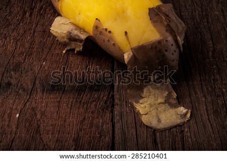 Fresh Hot Boiled Potato with Peeled Skins on Wood Table Background, Concept and Idea of Food Cook Rustic Still life Style. Close up.