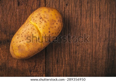 Fresh Hot Boiled Potato Unpeeled Skins on Wood Table Background, Concept and Idea of Food Cook Rustic Still life Style.