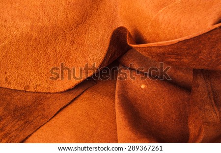 Brown, Orange Tan Leather, Concept and Idea Style of Fine Leather Crafting, Handcrafts, Handmade, handcrafted, leather worker. Background Textured and Wallpaper. Rustic Style.