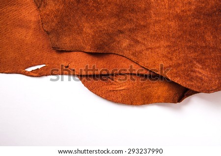 Leather Isolated with White, Orange Tan Brown, Concept and Idea Style of Fine Leather Crafting, Handcrafts, Handmade, Handcrafted, Leather Worker. Background Textured and Wallpaper. Rustic Style.