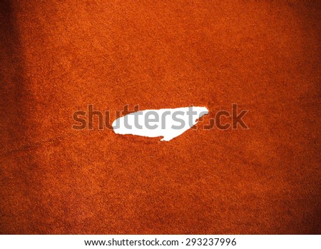 Leather  Orange Tan Brown. Torn, Tear, Isolated. Concept and Idea Style of Fine Leather Crafting, Handcrafts, Handmade, Handcrafted, Leather Worker. Background Textured and Wallpaper. Rustic Style.