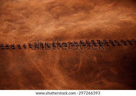 Leather Handmade Stitch (Brown Tan). Handcrafted Leather, Hand Sewing, Stitching and Crafting. Rustic Style. Background Textured and Wallpaper.