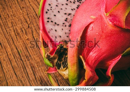 Dragon Fruit, Fresh Organic Harvest on Wood Table Background. Idea of Vibrant and Healthy Food. Country Rustic Still Life Style. Top View.