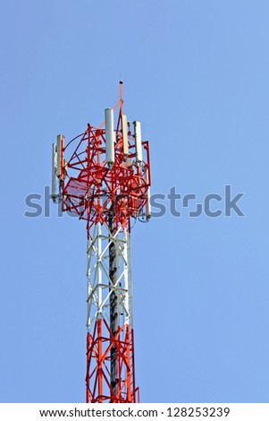 Antenna radio wave transmissions. Bright blue sky.