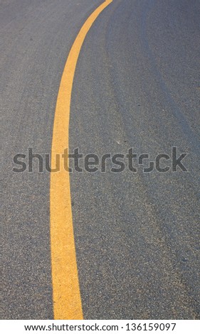 Asphalt lines lines yellow asphalt road background.