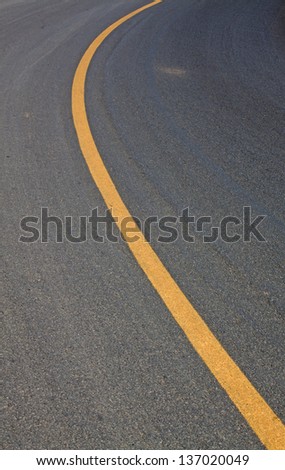 Asphalt lines lines yellow asphalt road background.