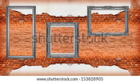 Black picture frame old red brick wall