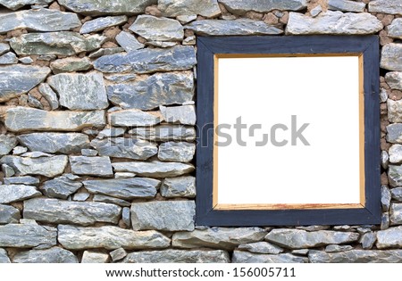 Old stone wall with a wood frame wall.