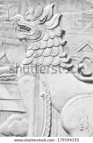 Lion statue wall plaster walls, outdoor public places.