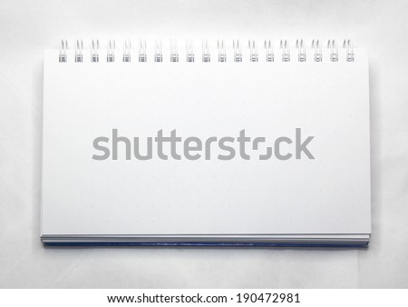 Blank realistic spiral notepad notebook on white
