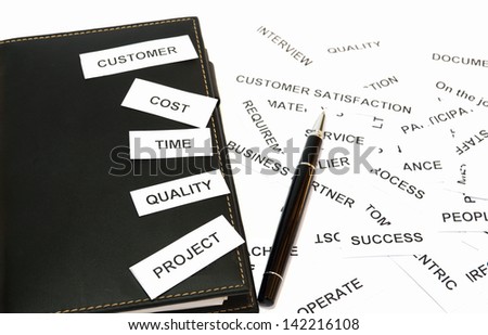 Business word concept.  Some major words put on the notebook.