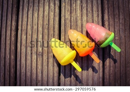 Three fruit flavored homemade ice lollies