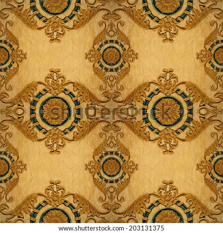 Gold ornament flower vintage pattern in old paper background Gold ornament flower vintage pattern in old paper background