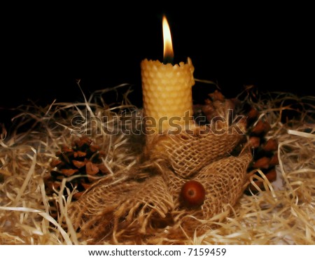 beeswax candle and natural christmas decorations