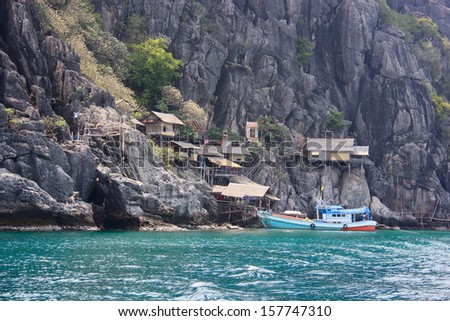 hut on a cliff by the sea, Thailand
