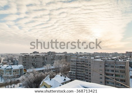 Winter cityscape in small russian town in sunny day