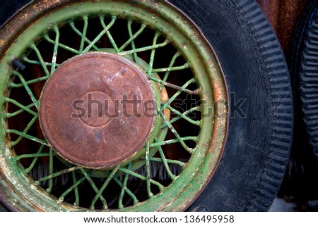 Vintage auto tire and spoked wheel rim