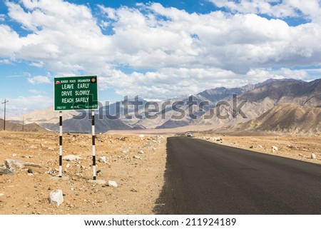 Safety rules on the road displayed near Leh in Ladakh, India