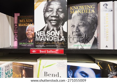 Changi, Singapore - January 13 2014: Books which focus on Nelson Mandela are displayed in a bookstore in Singapore airport.