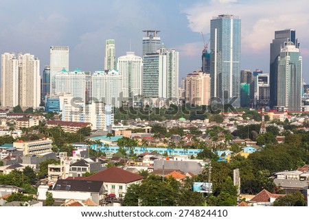 Jakarta, Indonesia capital city, is a mixed of modern buildings with villages like housing structure right in the center of the city