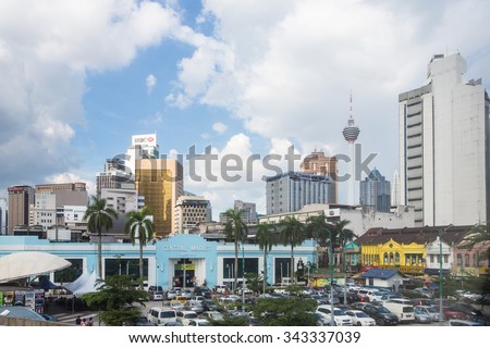 KUALA LUMPUR, MALAYSIA - NOVEMBER 14: The colonial architecture of the Central market contrast with modern bank office building. The city is an important islamic finance center.