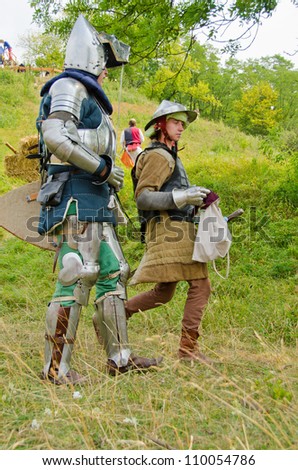 STRONSKO, POLAND - AUG 5: historical reconstruction of attacking a Medieval village during the First Knights Tournament for the prize of Zapolice Mayor,   August 5 2012, Stronsko, Poland