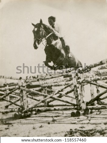 Vintage photo of woman riding a horse (forties)