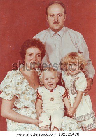 Vintage photo of parents and children (early eighties)