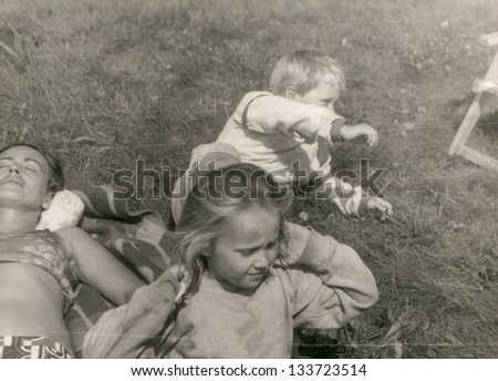 Vintage photo of mother and children (seventies)