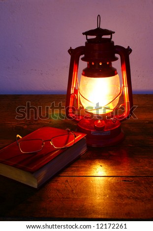 Paraffin Lamp on Reading At Paraffin Lamp Light Stock Photo 12172261 Shutterstock