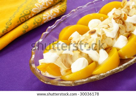 Crepe with peach, whipped cream  and roasted almonds