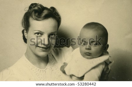 Vintage portrait of mother with her baby (forties)