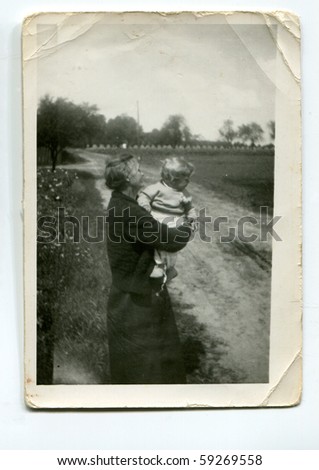 Vintage photo of grandmother and grandson