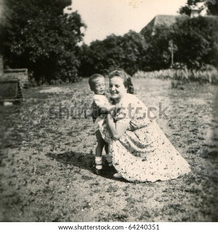 Vintage photo of mother and son (forties)