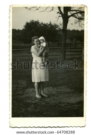 Vintage photo of mother with her baby (1949)