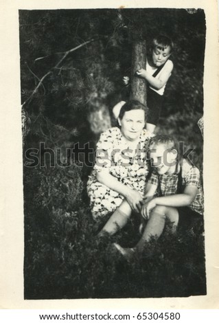 Vintage photo of grandmother and two grandsons