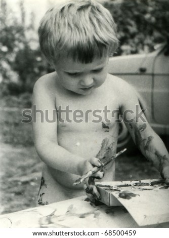 Vintage unretouched photo of young girl painting outdoor
