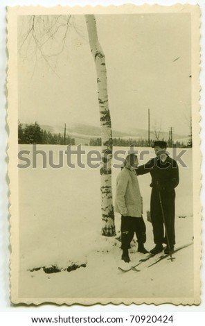 Vintage photo of skier and his wife (fifties)