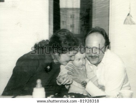 Vintage photo of parents and baby
