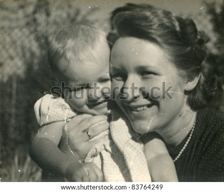 Vintage photo of mother and baby daughter (fifties)