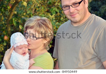 Parents with their 2 months old baby girl