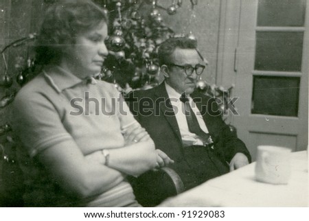 Vintage photo of couple at Christmas time (fifties)