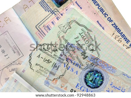 Passports  with Egypt and Zimbabwe visas and border stamps