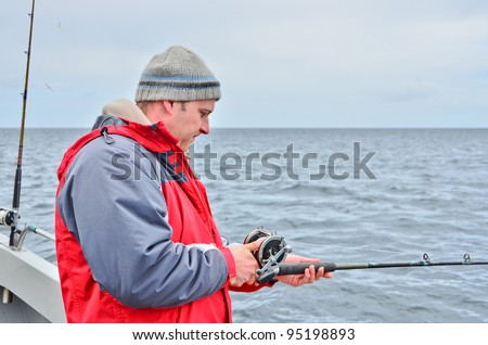 Fisherman on boat (deep sea fishing)