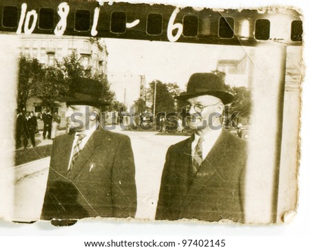 Vintage photo of two men walking (fifties)