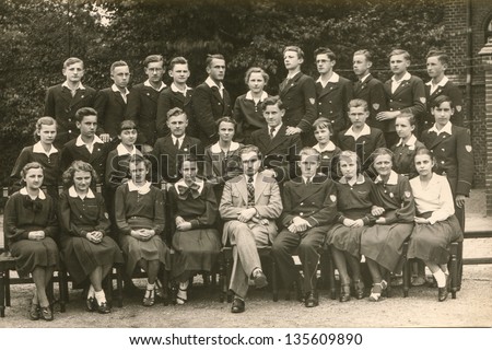 RAWICZ, POLAND, CIRCA 1939 -Vintage photo of group of school pupils (4th class of high school) with their teacher, Rawicz, Poland, circa 1939