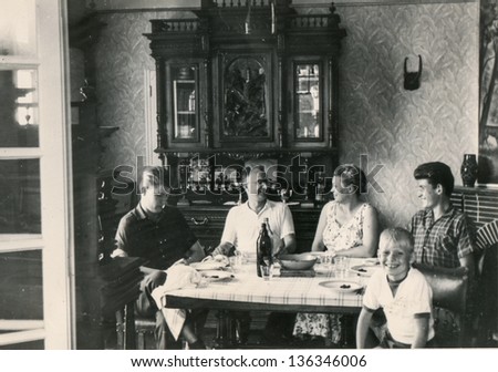 RAWICZ, POLAND, CIRCA 1940 - Vintage photo of unidentified big family dining together, Rawicz, Poland, circa 1940