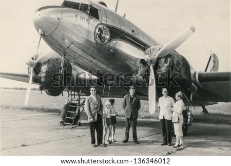 MOROCCO, CIRCA 1947 - Vintage photo of unidentified family in front of plane, Morocco, circa 1947